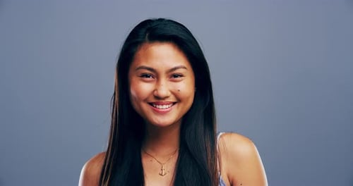 Young Woman Smiling Directly at the Camera