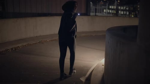 Mysterious Woman Wanders in the Dark City Night Exploring Hidden Alleys and Quiet Streets