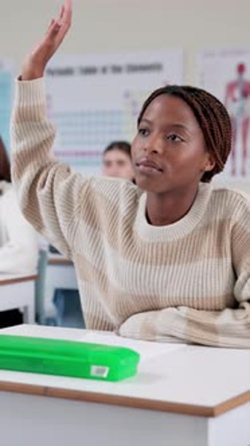 Raised hand, student and education with question or answer in classroom, growth and development