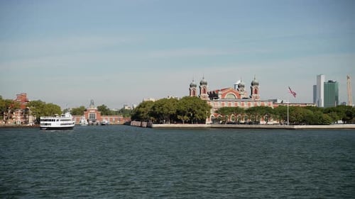 View Of The Ellis Island From A River