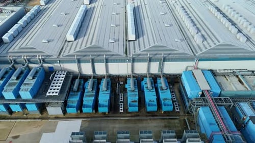 Aerial view of high-security colocation data center and quantum computing research facility.