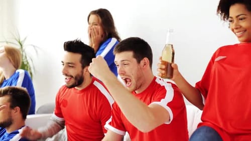 Friends Watching Sports Game at Home