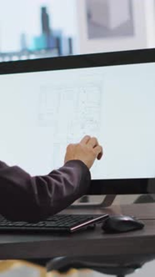 Vertical Video Technician Operating on Cad Software to Create Blueprint