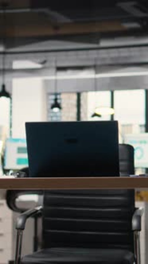 Vertical Video Modern Business Desk in Empty Office Showcases Workspace Prepared for Analytics