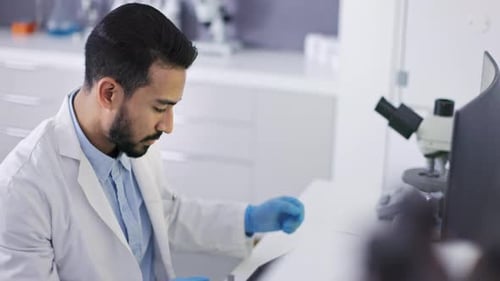 Scientist Working in Modern Lab Environment