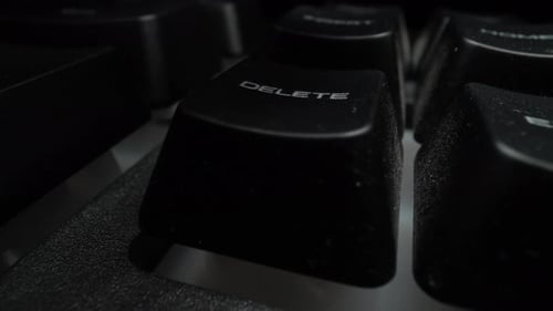 Pressing delete Key On a Black Computer Keyboard
