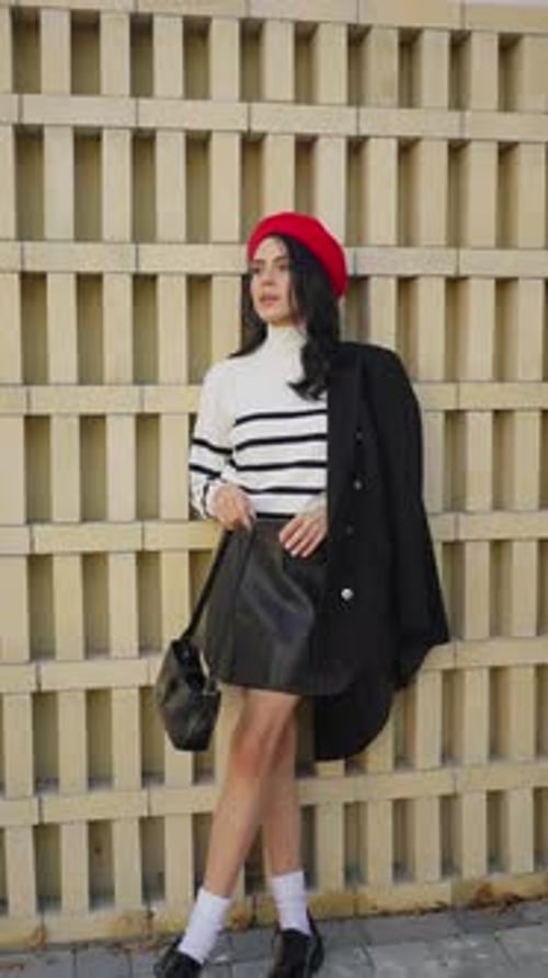 Stylish Woman Posing in Urban Fashion