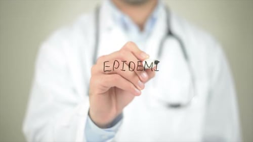 Doctor Writes the Word Epidemic in Close Up