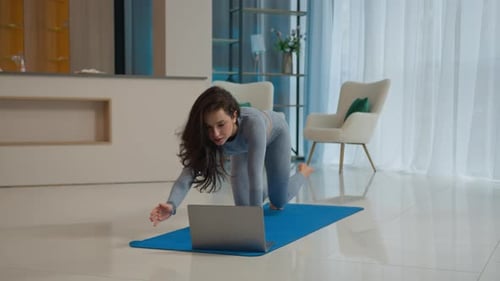 Yoga Class with Laptop Workout Video Tutorial Online Training at Home Fit Caucasian Woman Sport