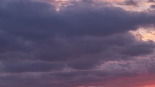 Colorful Sunrise or Sunset Sky with Pastel Pink Red Dark Cloud Golden Yellow Cloudscape