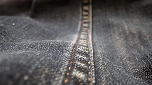 Macro Shot of Professional Factory Seam on Jeans Pants Casual Wear and Modern Fashion Closeup View