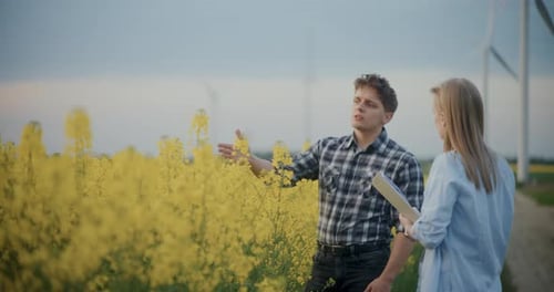 Farmer And Agronomist Discussing In Farm