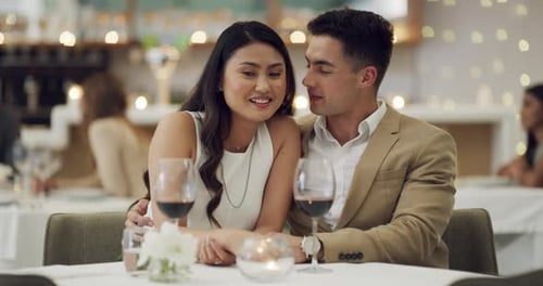 Secret, whisper or happy couple in restaurant to celebrate marriage anniversary at dinner at night