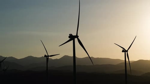 Wind Turbines Generating Clean Energy at Sunset