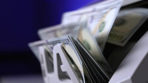 Hundred Dollar Bills Counted in Machine