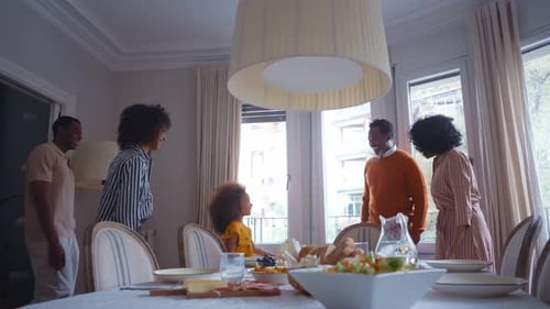 family reunited at parents house for lunch during the holidays.
