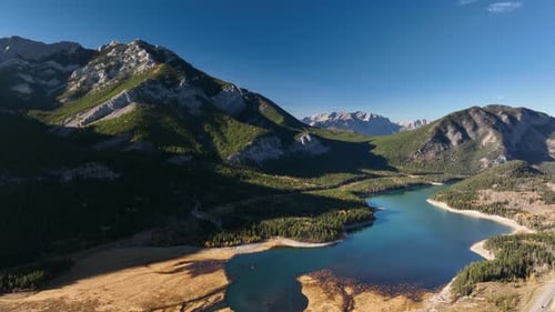 Drone view of a forest, rivers and mountains in the Rocky Mountains. Banff National Park, Canada