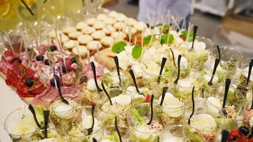 Catering Service on Banquet Table with Canape Snacks in Restaurant or Hotel Decorated Food Set on
