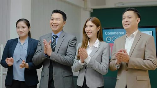 Attractive team of employee worker people partnership applause successful financial growth in office