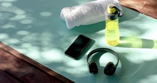 Yoga Mat with Fitness Accessories in Sunlight