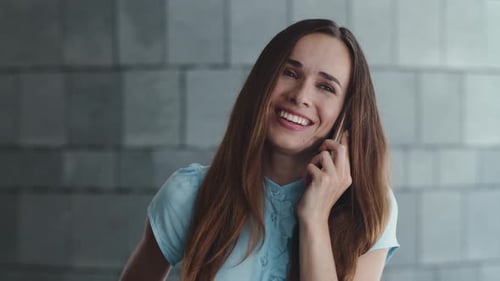 Portrait Of Smiling Businesswoman Calling On Cellphone At City Street. Laughing Woman Talking On ...