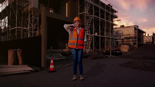 Asian Female Engineer Showing Thumbs Down Gesture And Shaking Her Head At Building Site