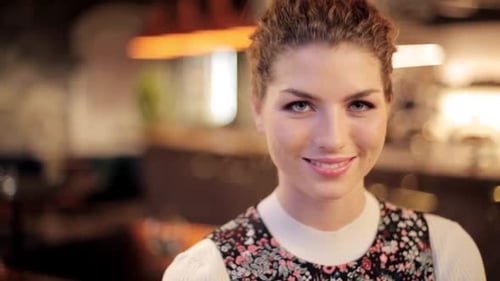 Smiling Young Woman Portrait in Soft Interior Light