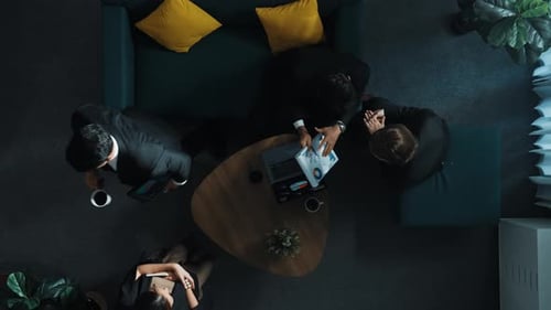 Top down view of business people analyze data and financial graph. Directorate.