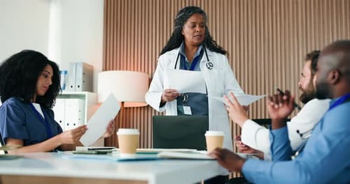 Woman, team and doctors at meeting, documents and discussion with report for workshop at hospital