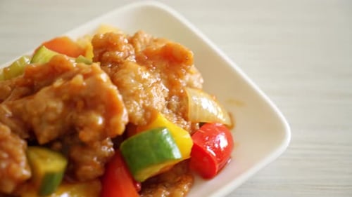 Savory Sweet and Sour Pork on White Plate