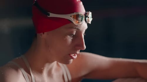 Tired Female Swimmer Breathing Hard After Training In Swimming Pool Closeup Portrait In Water