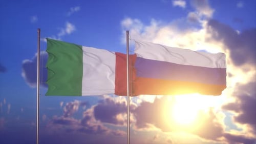Italy and Russia Flags Waving Together at Sunset
