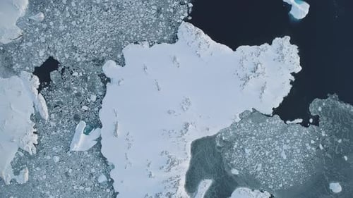 Antarctica Iceberg Aerial Top Down Flight View