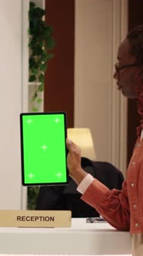 Vertical Video Weary Tourist Holding Chroma Key Tablet
