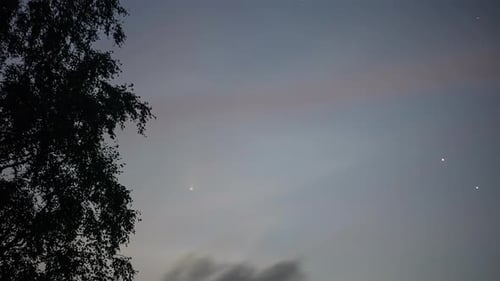 Comet with trail fly in night sky, fusion time lapse