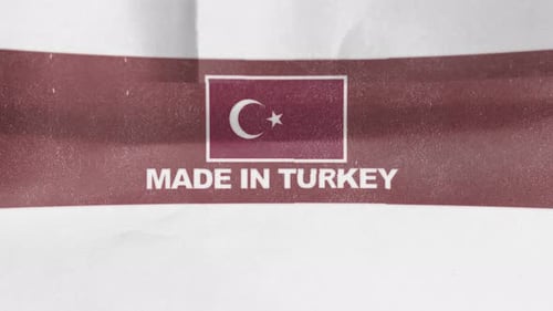 Made In Turkey Label Reveal On Textured Paper