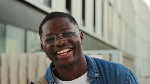 Smiling Young Man in City Close-up
