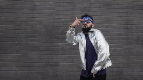 Stylish Man Hip Hop Dancer Dancing Freestyle on Street