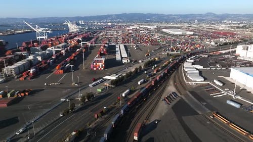 Logistics and Transportation of Container Cargo Ship with Working Crane Bridge in Shipyard