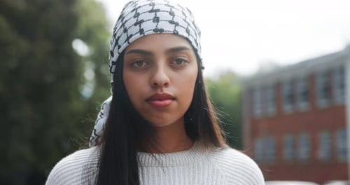 Portrait, protest and keffiyeh for female activist, justice and support for Palestine