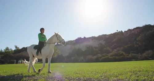 Girl Riding Horse on Ranch Lifestyle of Peaceful Horseback Rides