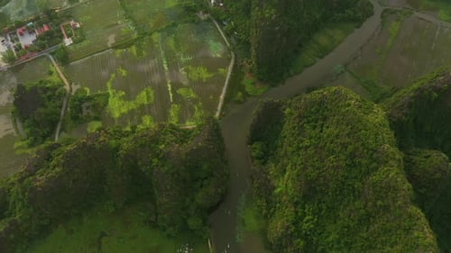 Nature, mountains with agriculture and village from drone, travel and farming environment