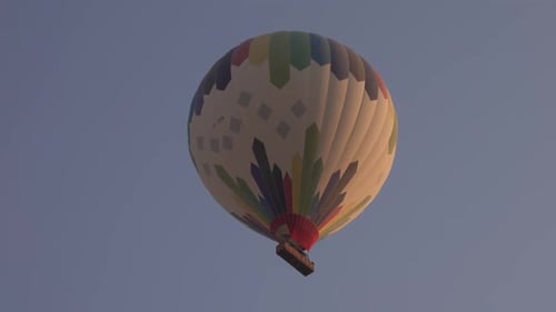Colorful Hot Air Balloon Ascending Into Sky