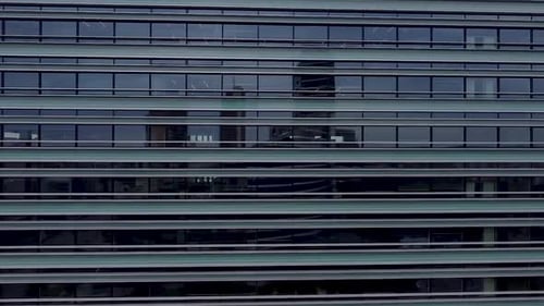 Cinematic shot of windows of a business park building