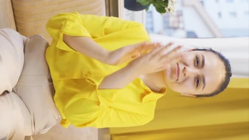 Woman Clapping and Giving Thumbs Up