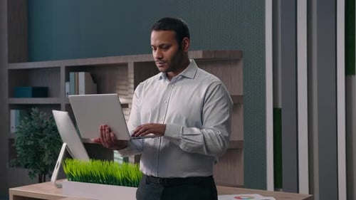 American Male Office Worker Standing at Workplace in Corporate Company Businessman Working with
