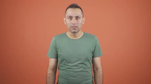 Man Reacting with Shock, Laughter, and Joy