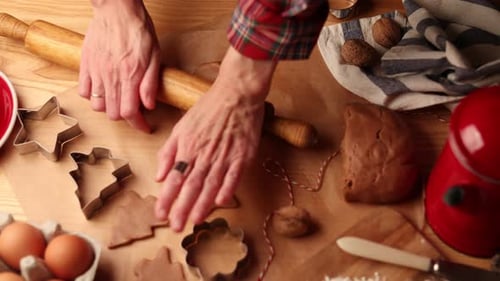 Preparing Holiday Gingerbread Cookies with Rolling Pin