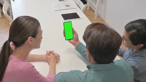 Rear View of Multi Ethnic People Using Phone with Green Screen