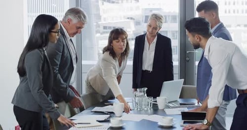 Diverse Business Team Meeting in Bright Modern Office